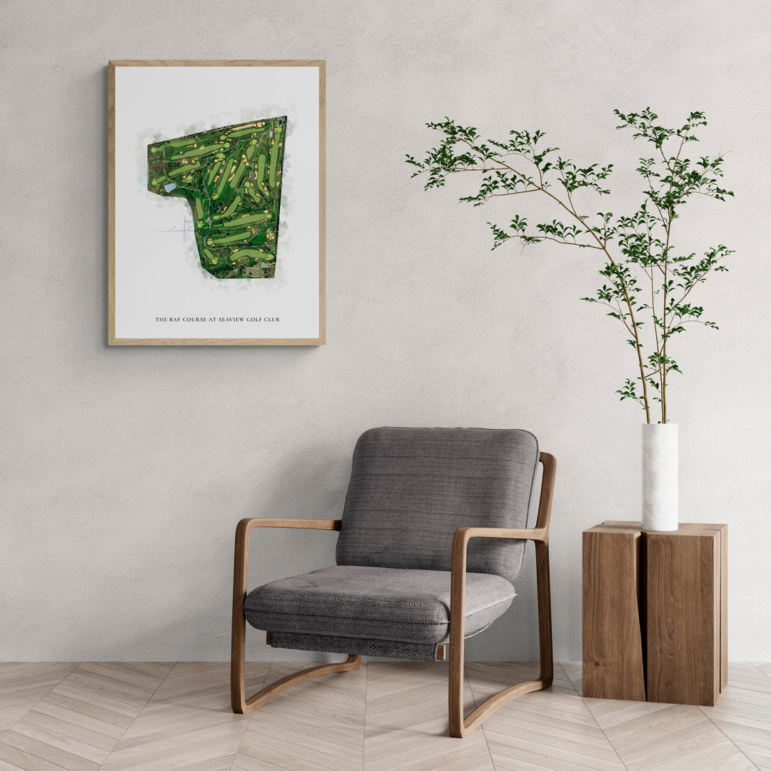 Classic Map of The Bay Course At Seaview Golf Club with a comfy armchair and large plant