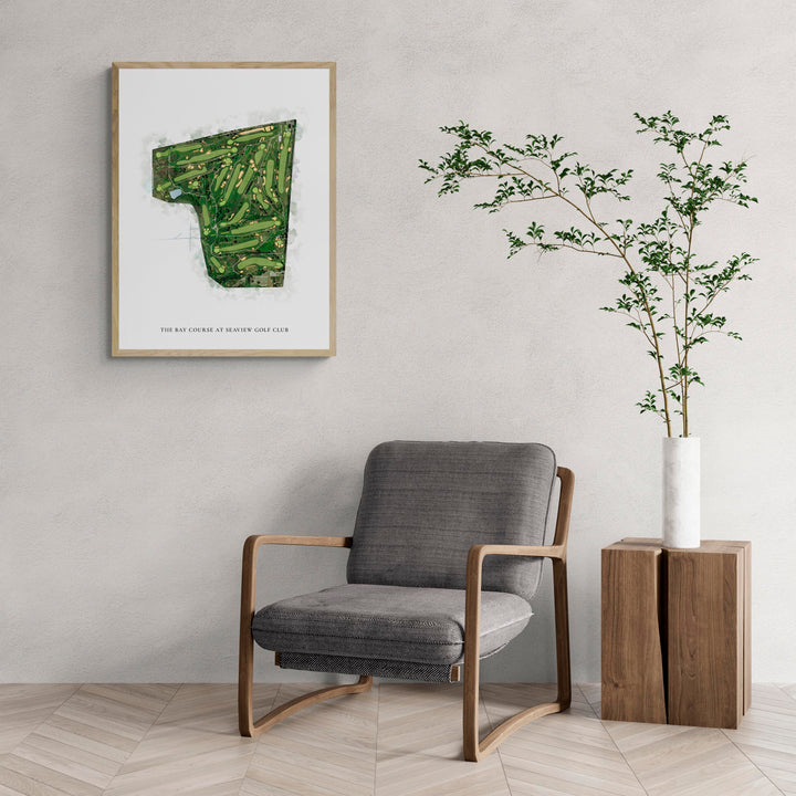 Classic Map of The Bay Course At Seaview Golf Club with a comfy armchair and large plant