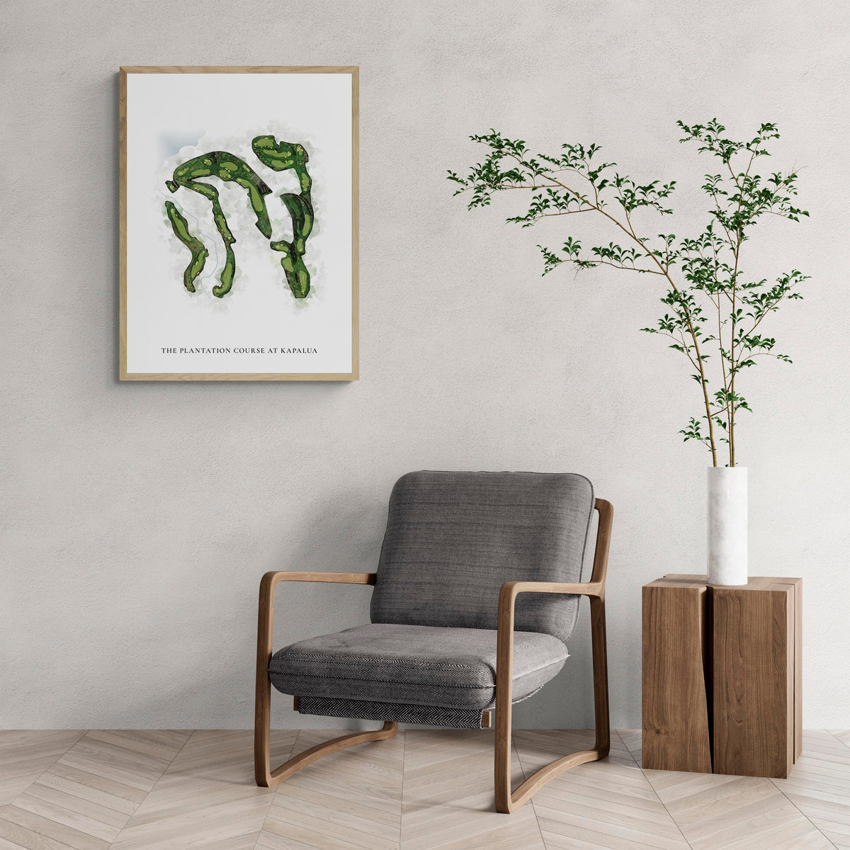 Classic Map of The Plantation Course At Kapalua with a comfy armchair and large plant