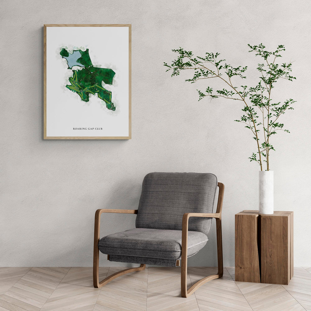 Classic Map of Roaring Gap Club with a comfy armchair and large plant