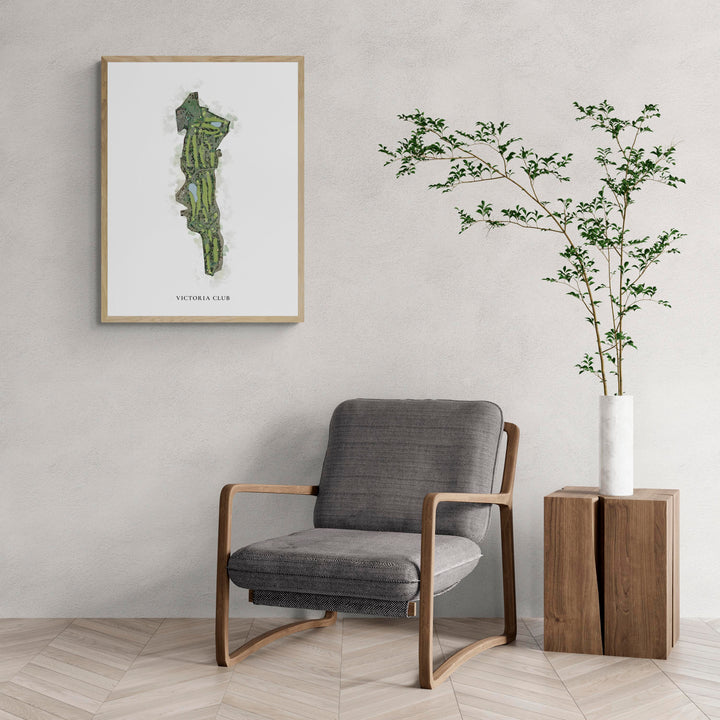 Classic Map of Victoria Club with a comfy armchair and large plant
