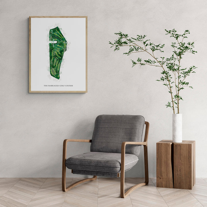 Classic Map of The Barracks Golf Course with a comfy armchair and large plant