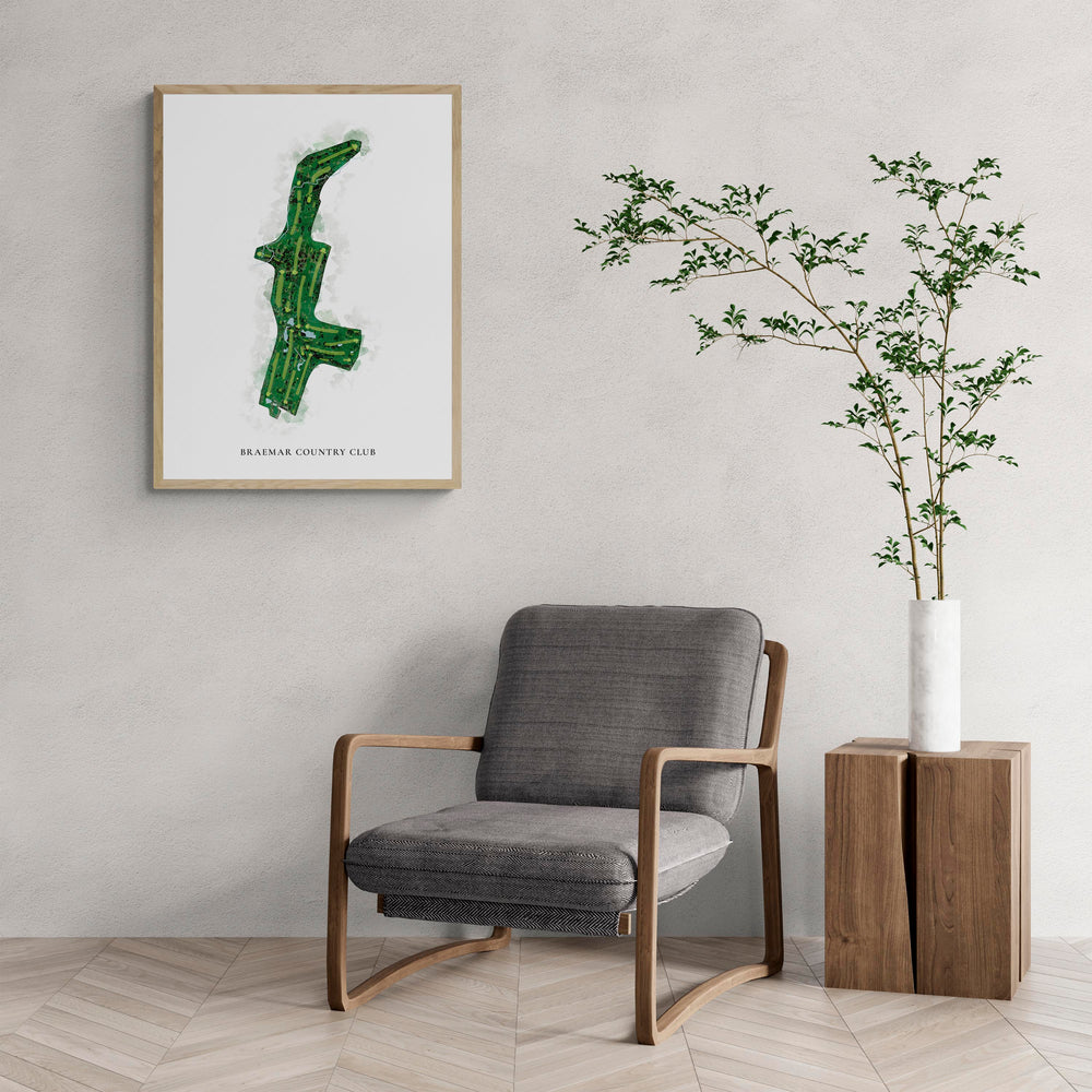 Classic Map of Braemar Country Club with a comfy armchair and large plant