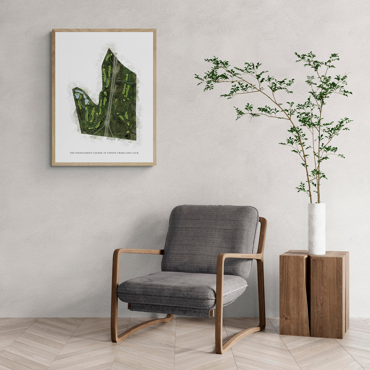 Classic Map of The Tournament Course At Coyote Creek Golf Club with a comfy armchair and large plant