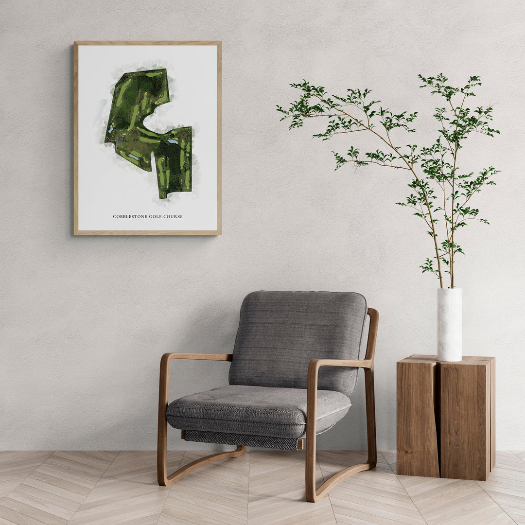 Classic Map of Cobblestone Golf Course with a comfy armchair and large plant