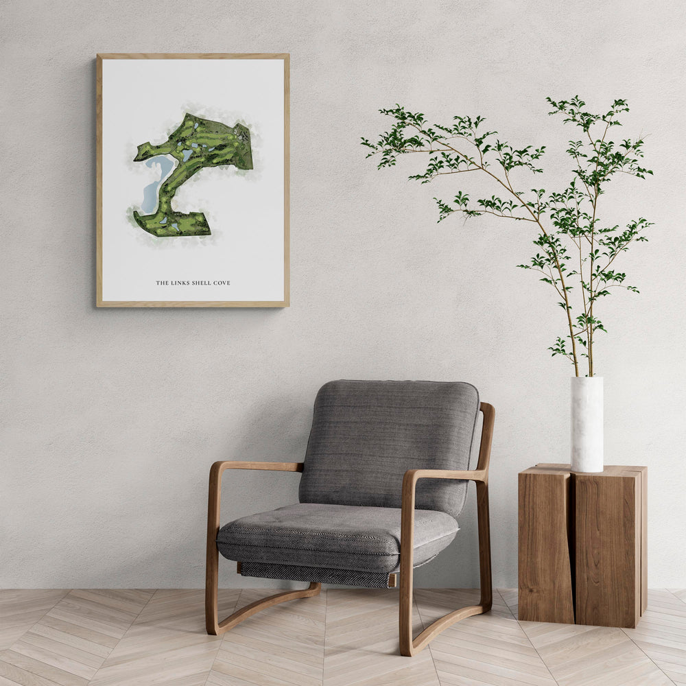 Classic Map of The Links Shell Cove with a comfy armchair and large plant
