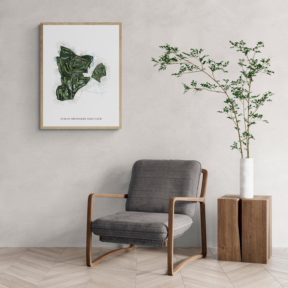 Classic Map of Lyman Orchards Golf Club with a comfy armchair and large plant