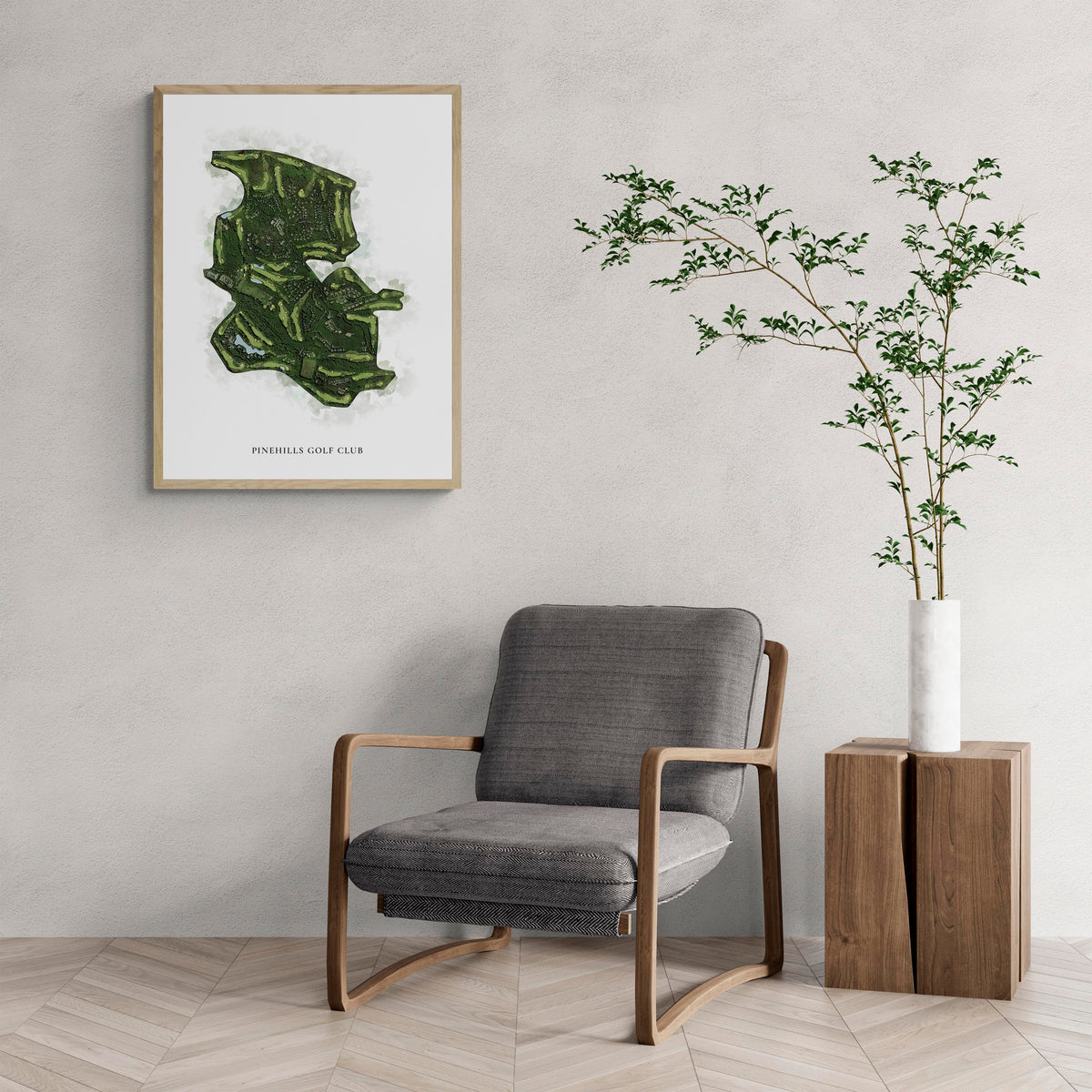 Classic Map of Pinehills Golf Club with a comfy armchair and large plant