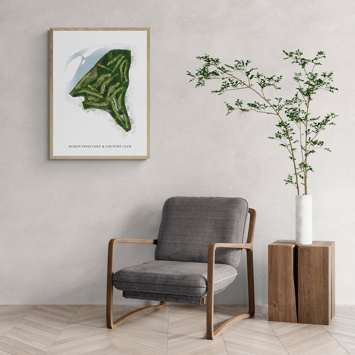 Classic Map of Huron Pines Golf &amp; Country Club with a comfy armchair and large plant