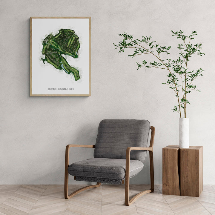 Classic Map of Crofton Country Club with a comfy armchair and large plant