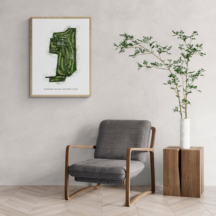 Classic Map of Radnor Valley Country Club with a comfy armchair and large plant