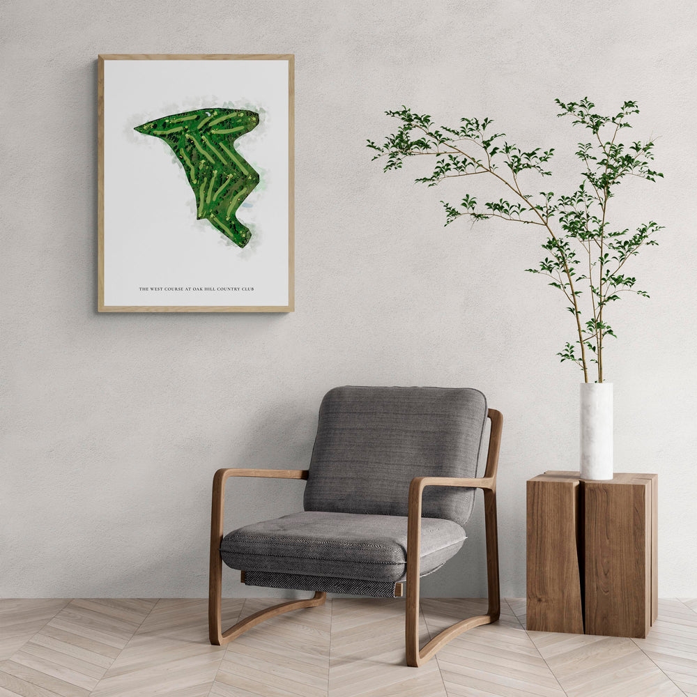 Classic Map of The West Course At Oak Hill Country Club with a comfy armchair and large plant