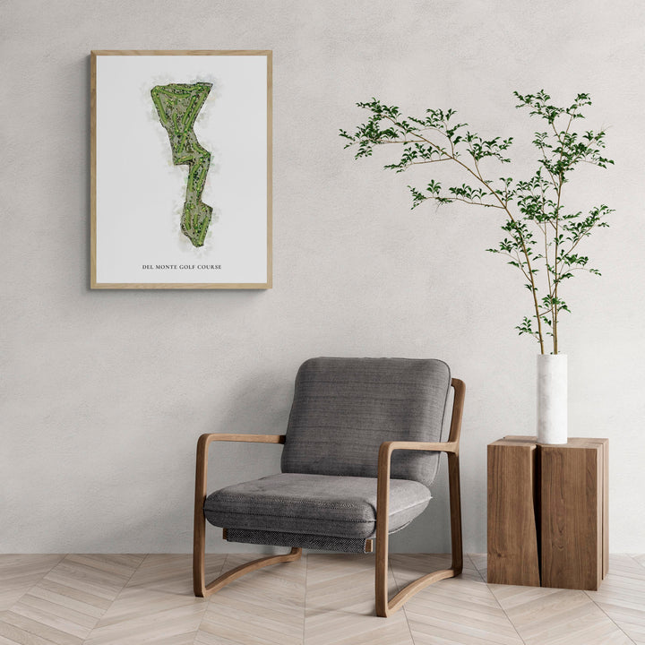 Classic Map of Del Monte Golf Course with a comfy armchair and large plant