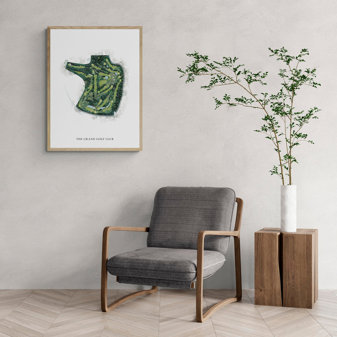 Classic Map of The Grand Golf Club with a comfy armchair and large plant