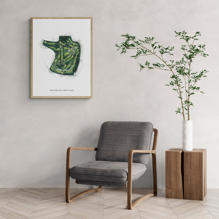 Classic Map of The Grand Golf Club with a comfy armchair and large plant