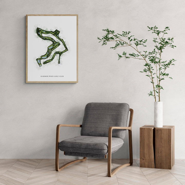 Classic Map of Harbor Pines Golf Club with a comfy armchair and large plant