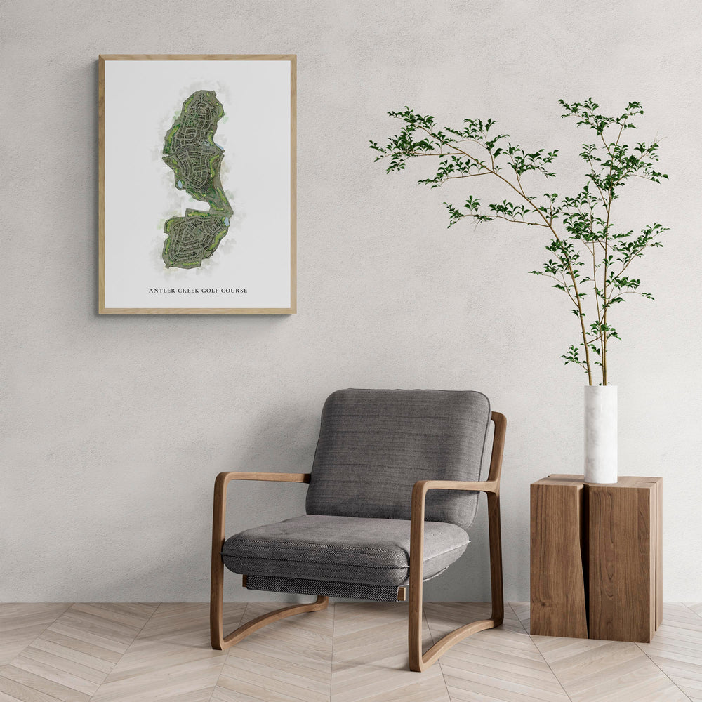 Classic Map of Antler Creek Golf Course with a comfy armchair and large plant