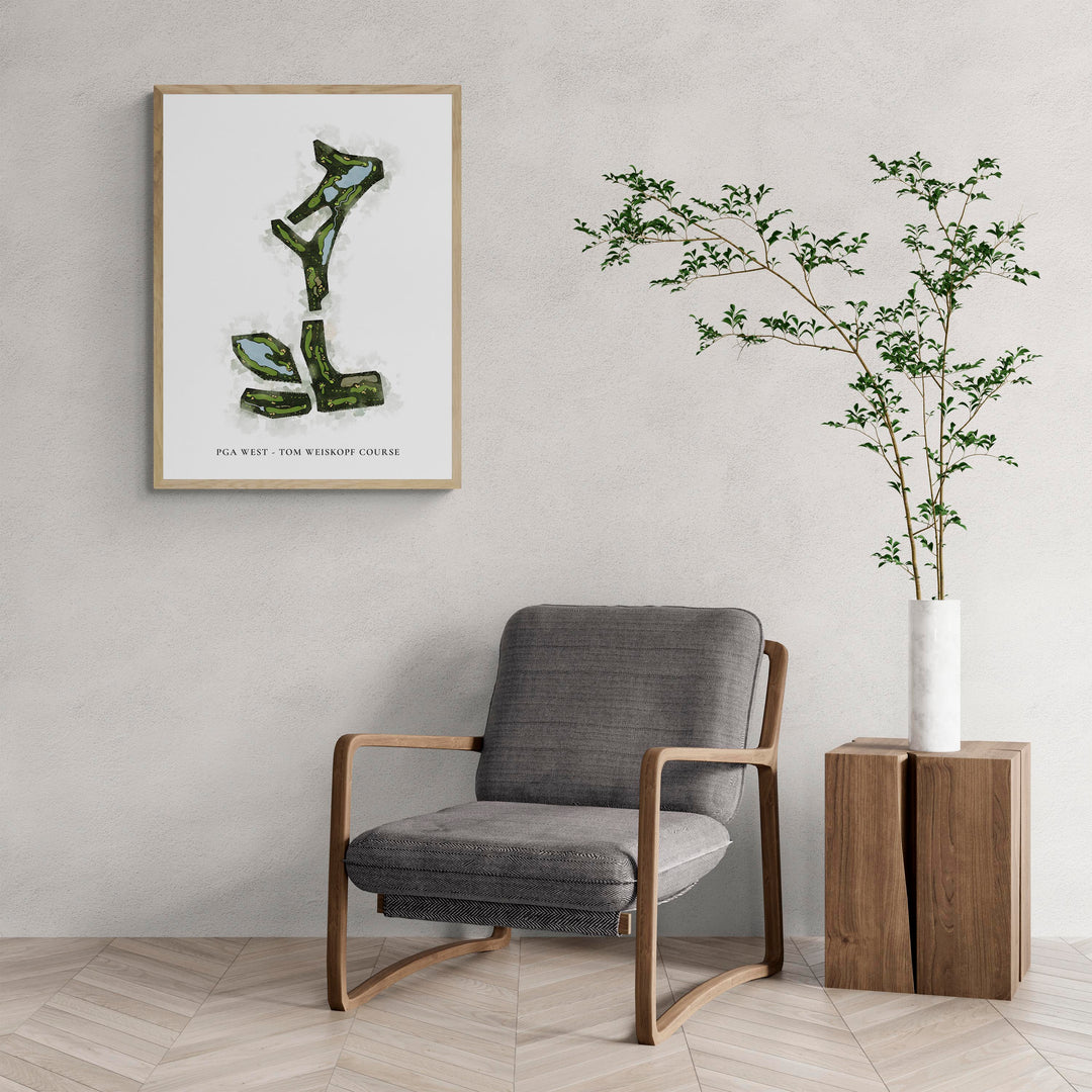 Classic Map of Pga West - Tom Weiskopf Course with a comfy armchair and large plant