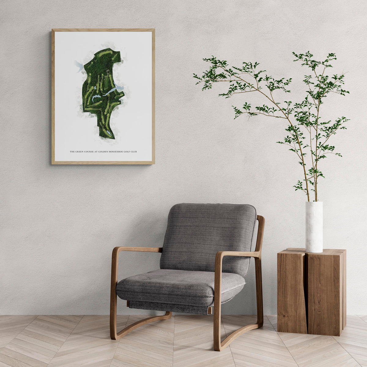 Classic Map of The Green Course At Golden Horseshoe Golf Club with a comfy armchair and large plant