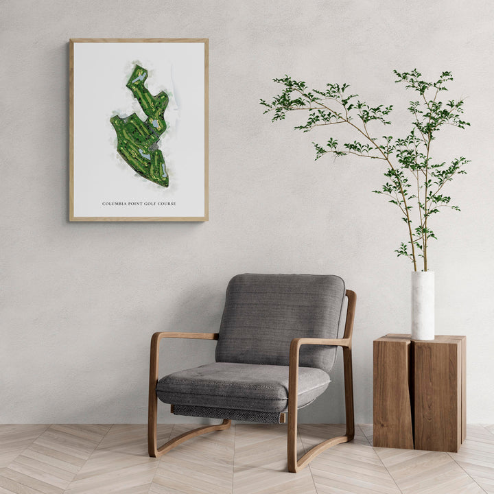 Classic Map of Columbia Point Golf Course with a comfy armchair and large plant