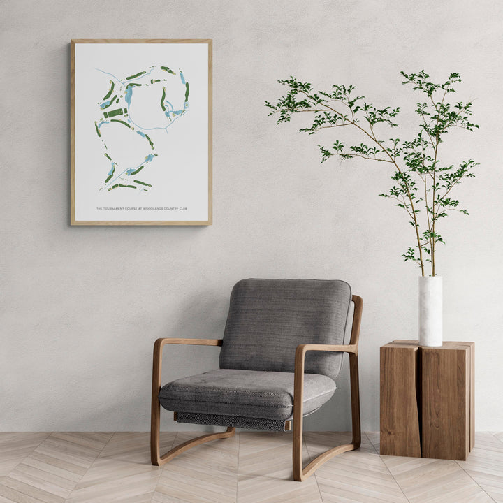 Modern Map of The Tournament Course At Woodlands Country Club with a comfy armchair and large plant